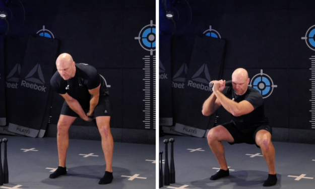 Clubbell Two Handed Shoulder Clean Clubbell Two Handed Shoulder Clean